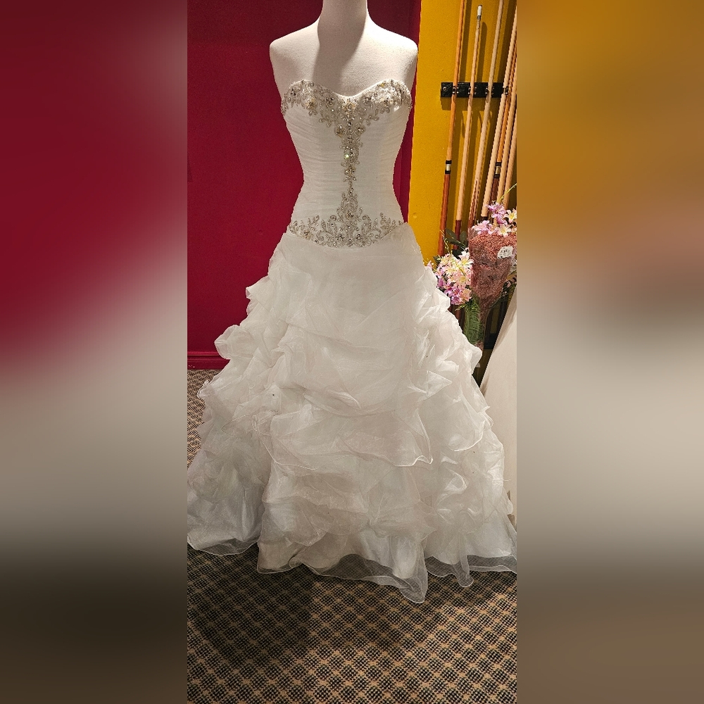 Strapless bridal Gown with beaded bodice. Brand new. Ivory